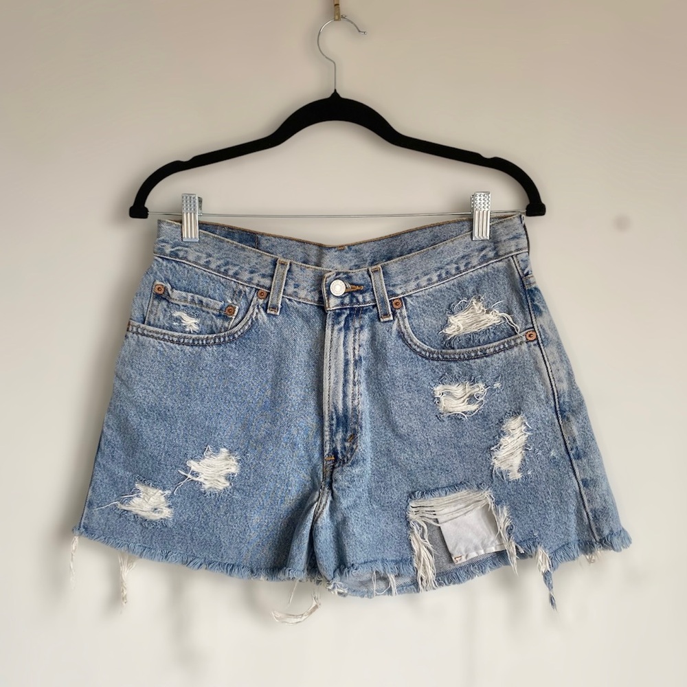 Vintage Levi’s 550 cut-off distressed denim shorts